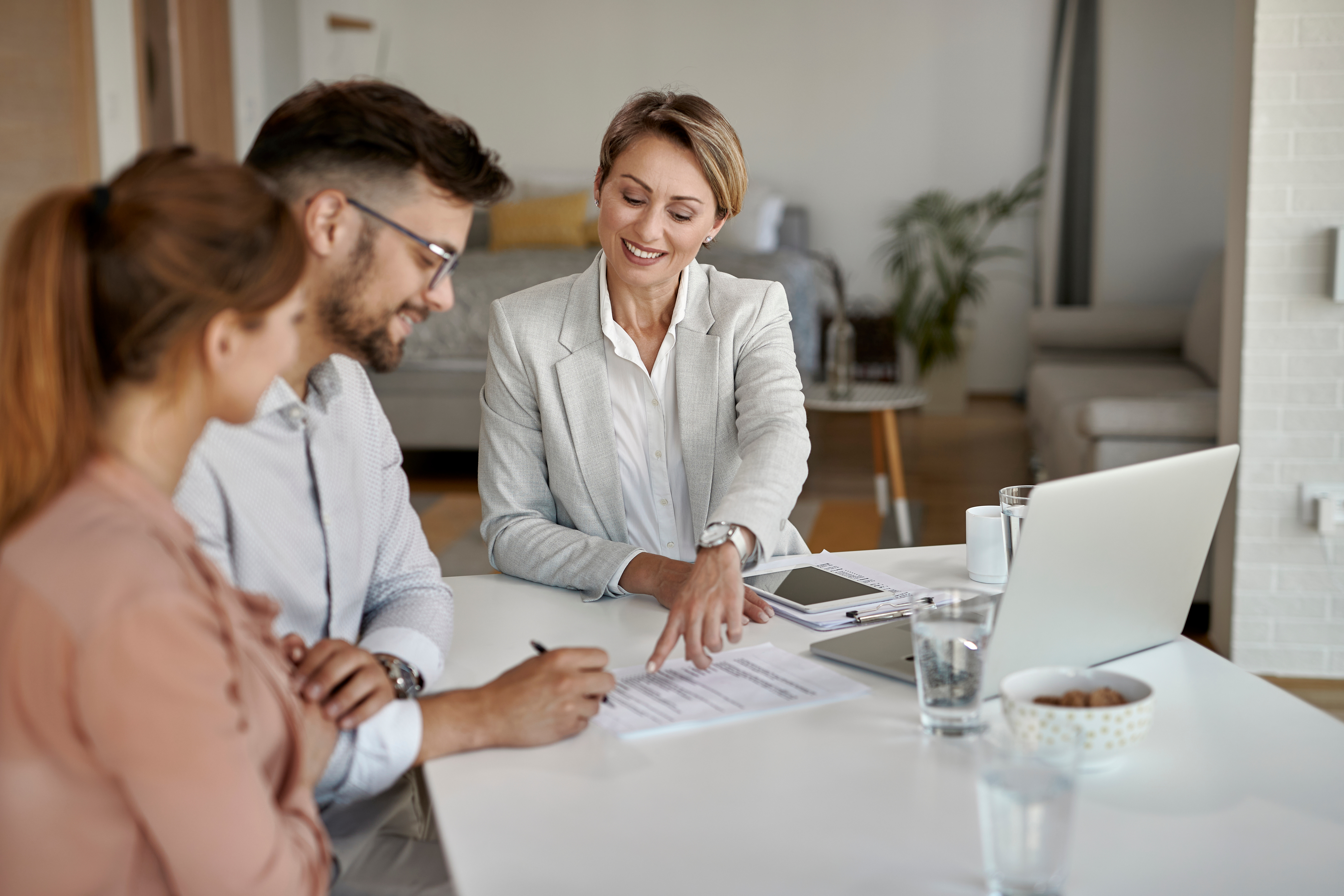 A real estate associate educating their clients.
